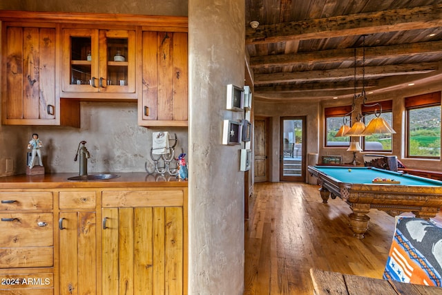 game room featuring sink, billiards, hardwood / wood-style floors, beam ceiling, and wooden ceiling