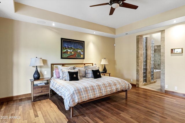 bedroom with baseboards, recessed lighting, wood finished floors, and a ceiling fan