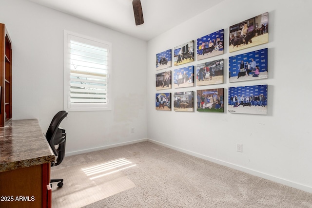 office area featuring baseboards, a ceiling fan, and carpet floors