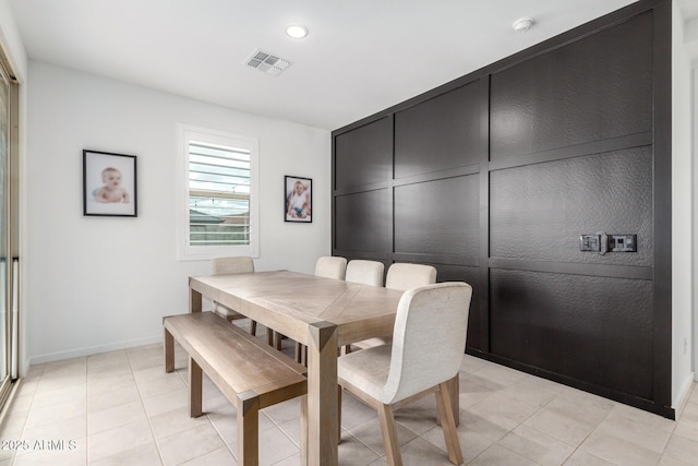 dining room featuring recessed lighting, baseboards, visible vents, and light tile patterned floors