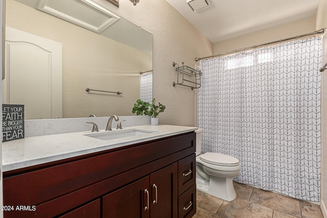 full bath featuring curtained shower, vanity, and toilet