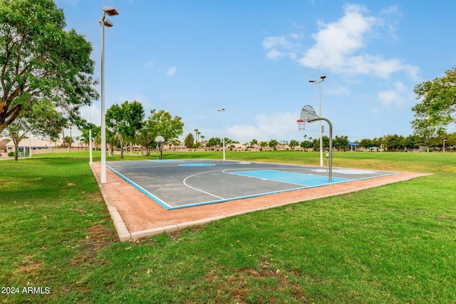 view of sport court with community basketball court and a yard