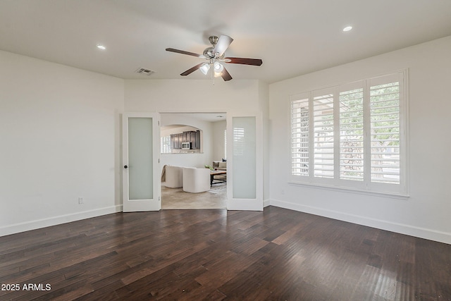4067 S White Dr, Chandler, AZ 85249 - unfurnished living room with ceiling fan, wood finished floors, baseboards, and recessed lighting