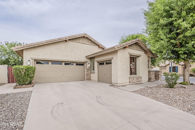 4067 S White Dr, Chandler, AZ 85249 - view of front of house featuring a garage, driveway, and stucco siding