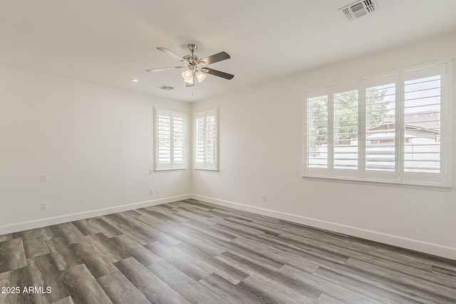 4067 S White Dr, Chandler, AZ 85249 - empty room featuring wood finished floors, ceiling fan, baseboards, and recessed lighting