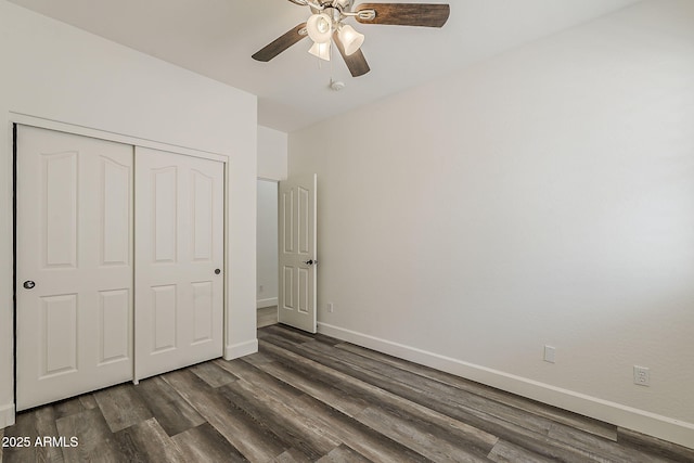 4067 S White Dr, Chandler, AZ 85249 - unfurnished bedroom with dark wood-style floors, baseboards, a closet, and a ceiling fan