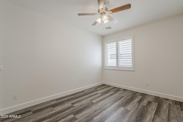 4067 S White Dr, Chandler, AZ 85249 - spare room with dark wood-style flooring, baseboards, and a ceiling fan