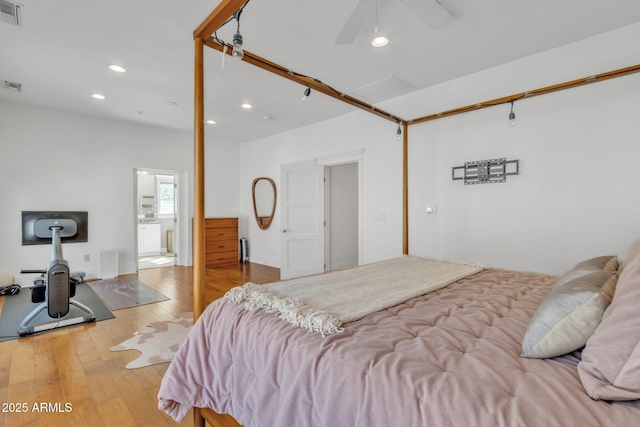 bedroom with light wood finished floors, ceiling fan, visible vents, and recessed lighting