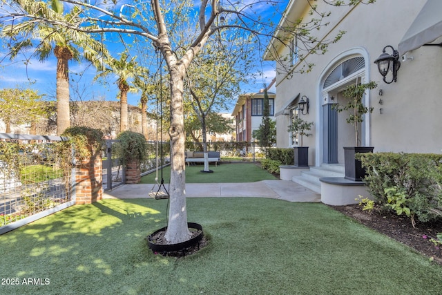 view of yard with fence