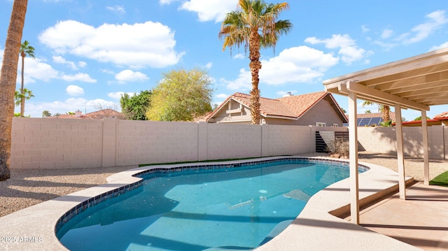 view of swimming pool featuring a fenced backyard, a fenced in pool, and a patio