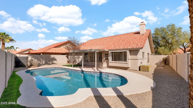 view of pool with central air condition unit, a patio area, a fenced backyard, and a fenced in pool