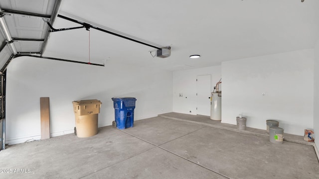 garage with water heater and a garage door opener