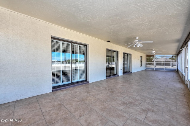 view of patio / terrace featuring ceiling fan