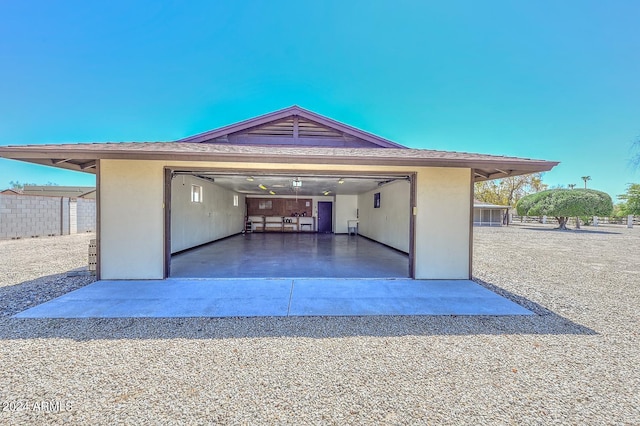 exterior space featuring a carport