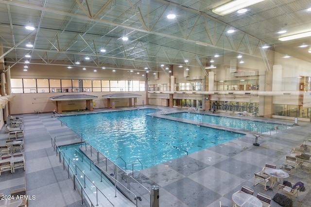 view of pool with a jacuzzi