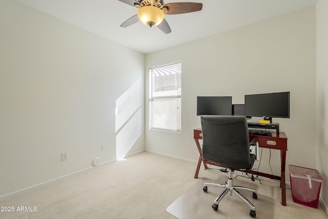 office with ceiling fan, baseboards, and carpet flooring