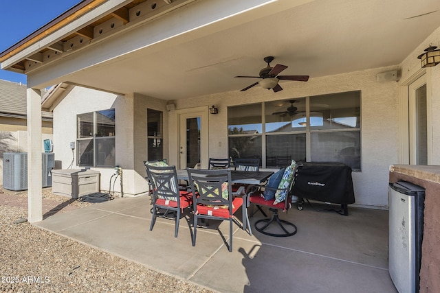 view of patio / terrace featuring outdoor dining area and a ceiling fan