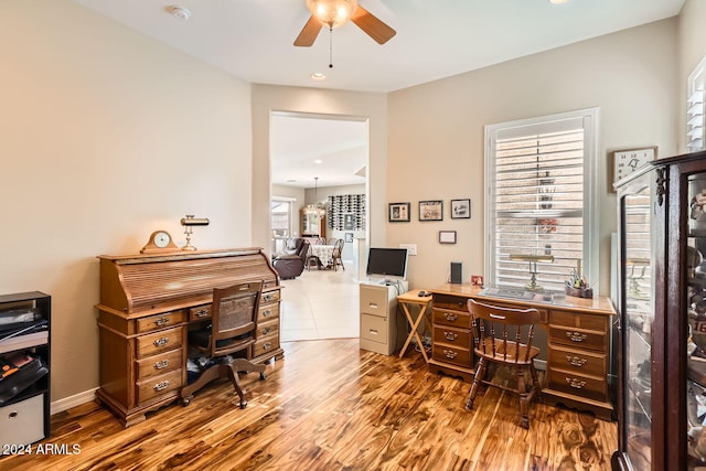 office featuring hardwood / wood-style flooring and ceiling fan