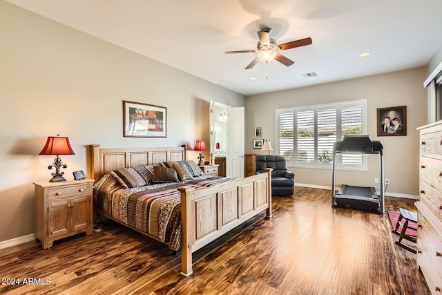 bedroom featuring ceiling fan and dark wood-type flooring