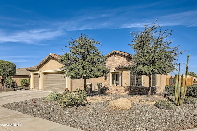 view of front of property with a garage