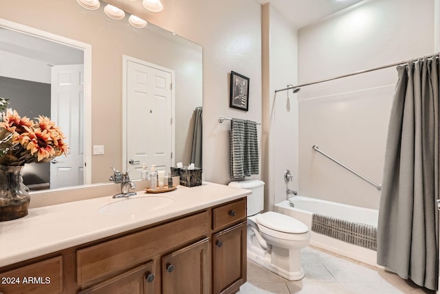 full bathroom featuring toilet, vanity, tile patterned floors, and shower / tub combo with curtain