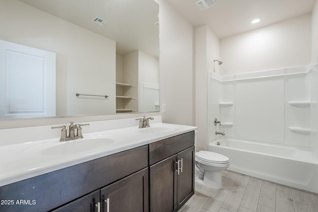 full bath with visible vents, a sink, and toilet