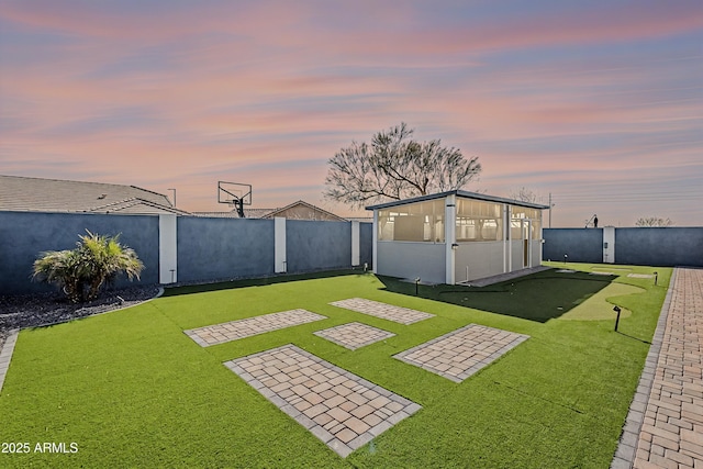 view of yard featuring a patio and a fenced backyard