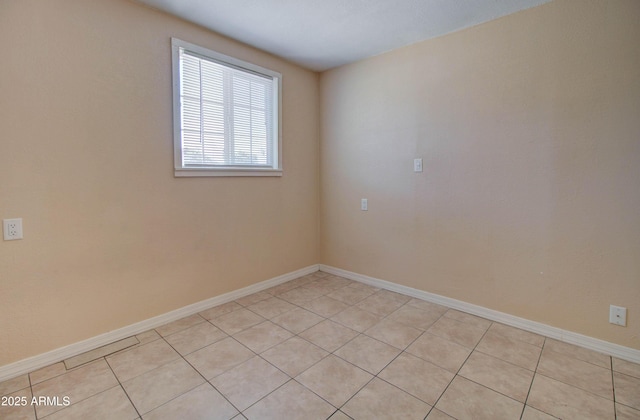 view of tiled spare room