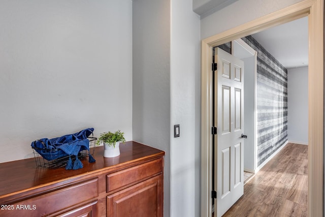 hallway featuring light hardwood / wood-style flooring