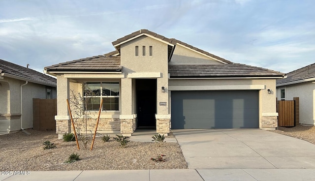 view of front of property with a garage