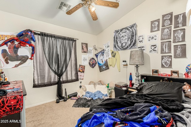 bedroom with vaulted ceiling, carpet floors, and ceiling fan