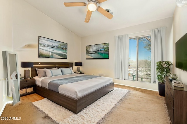 bedroom with ceiling fan and lofted ceiling