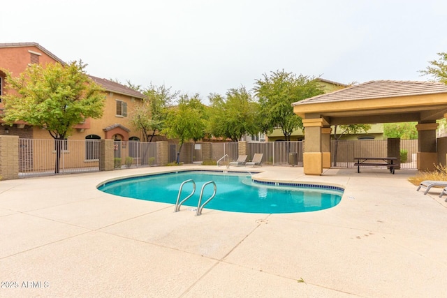 view of pool featuring a gazebo and a patio