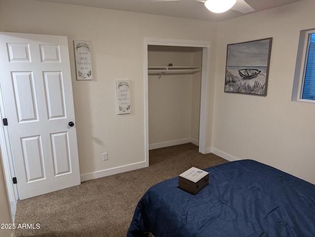 bedroom featuring ceiling fan, carpet, and a closet
