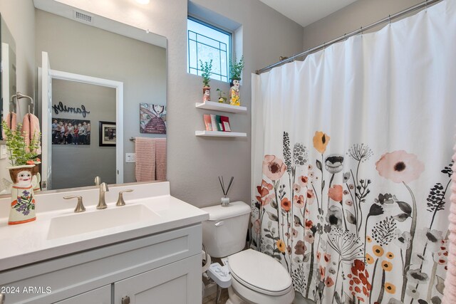 bathroom featuring vanity, hardwood / wood-style floors, and walk in shower