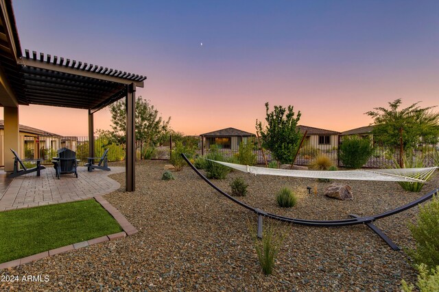 view of patio featuring ceiling fan