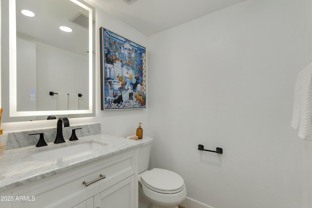 bathroom featuring recessed lighting, visible vents, toilet, and vanity