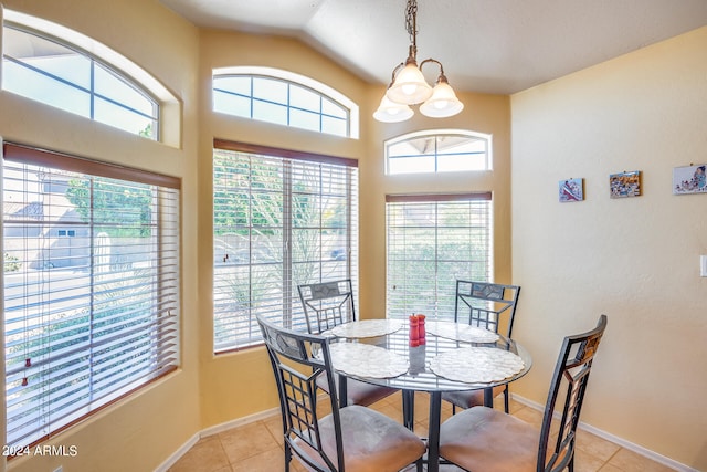 tiled dining area with a notable chandelier