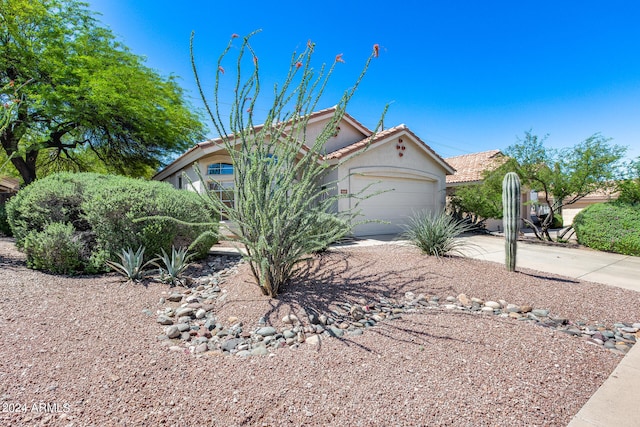 view of front of property featuring a garage