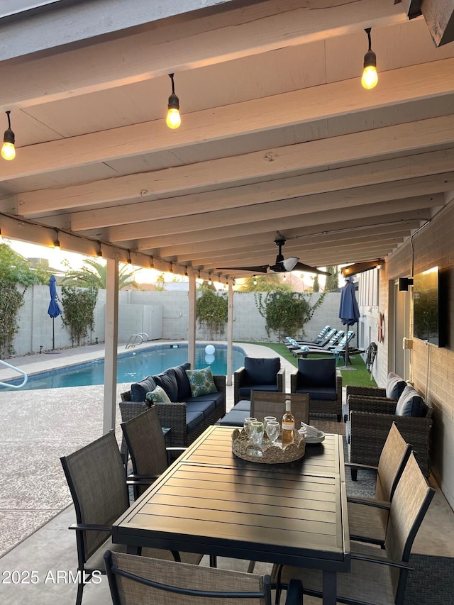 view of patio with ceiling fan, an outdoor living space, and a fenced in pool