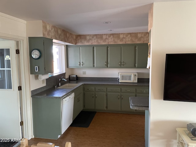 kitchen with sink and white appliances