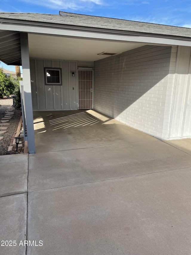 garage with a carport