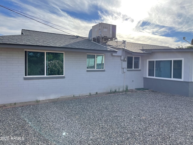 view of side of property featuring cooling unit