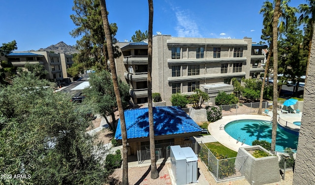 pool featuring fence and a gate