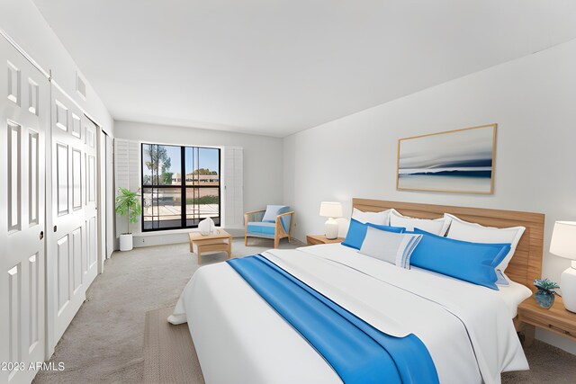 bedroom featuring carpet floors and visible vents