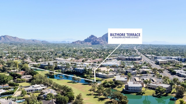 bird's eye view featuring a water and mountain view