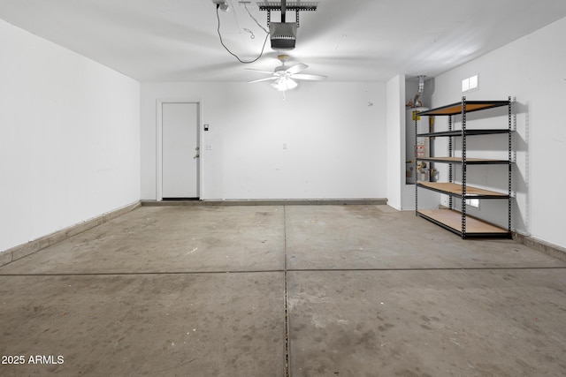 1750 E Desert Rose Trl, San Tan Valley, AZ 85143 - garage with baseboards, ceiling fan, and a garage door opener