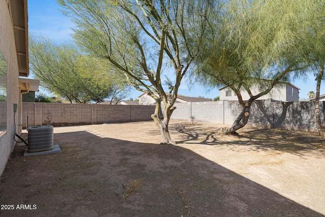 1750 E Desert Rose Trl, San Tan Valley, AZ 85143 - view of yard with a fenced backyard and central AC unit