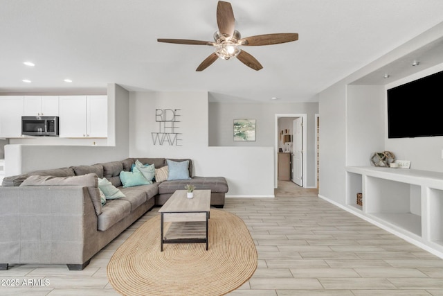 living room with ceiling fan