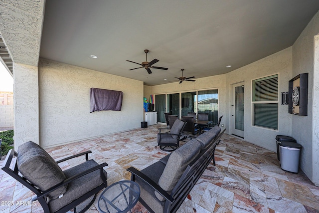 view of patio with a ceiling fan